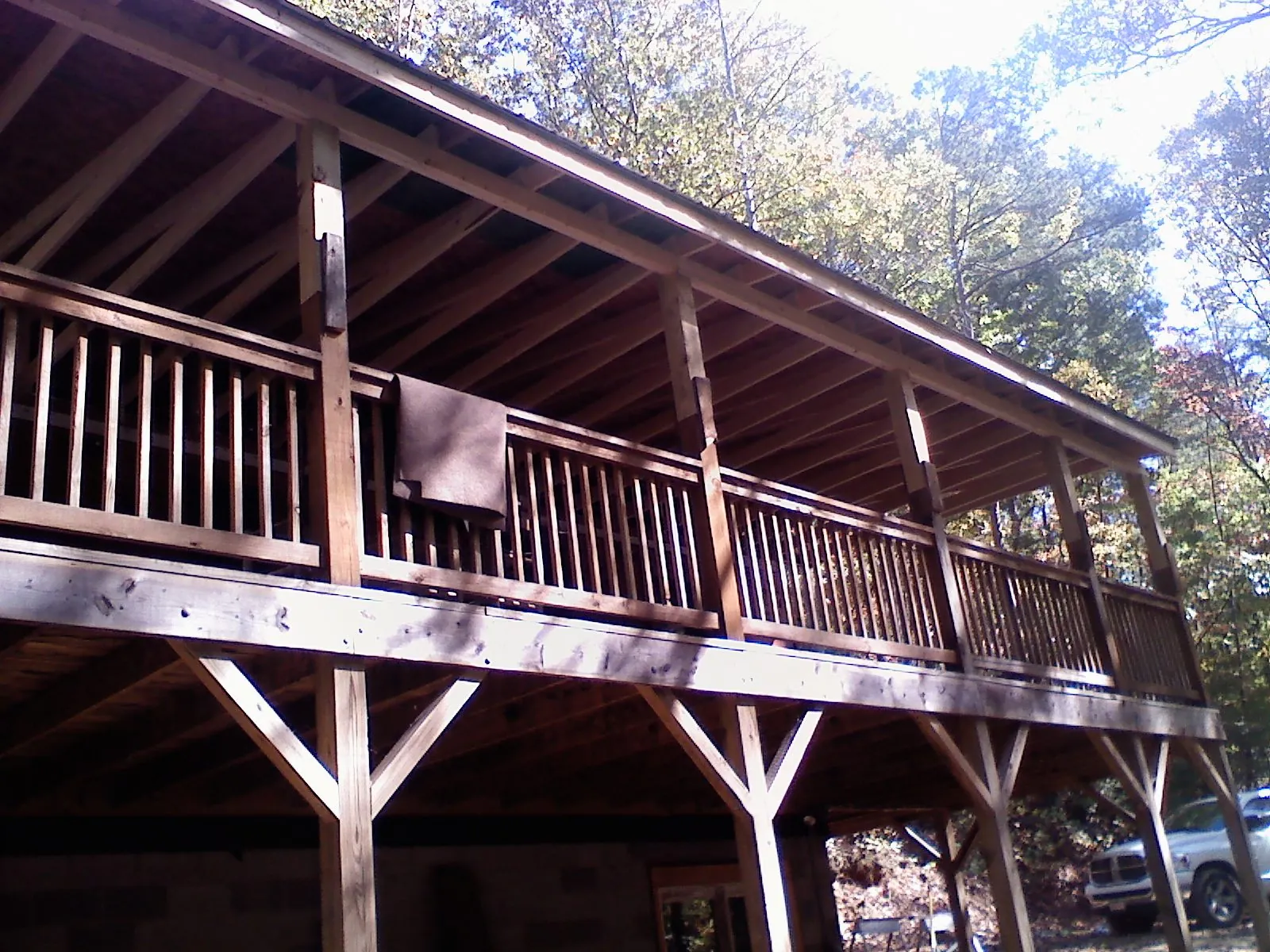 Timber framing under a new elevated porch and deck — Roof Leak Repair in West Suffield by Roofing Brothers